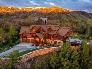 This stunning mountain home offers luxurious living with breathtaking views.