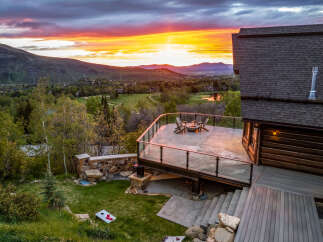 Experience luxury living with this stunning property featuring a spacious deck perfect for entertaining.