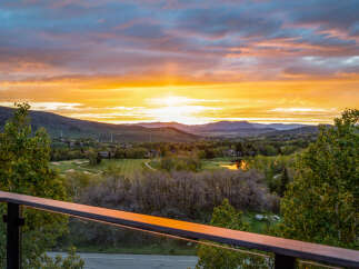 Experience breathtaking sunsets from this stunning property.