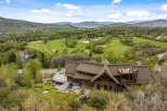 This stunning property boasts a luxurious log cabin design, offering a unique and inviting living experience.