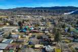 Discover the charm of this picturesque neighborhood nestled against a backdrop of majestic mountains.