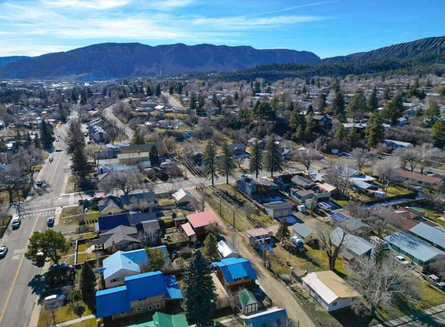 Discover the charm of this picturesque neighborhood nestled against a stunning mountain backdrop.