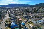 Discover the charm of this picturesque neighborhood nestled against a stunning mountain backdrop.