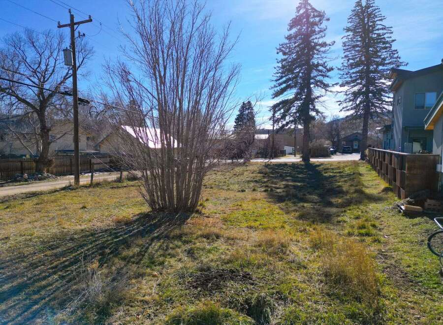Discover a charming property with a spacious yard, perfect for outdoor activities and relaxation.