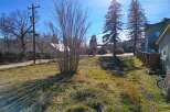Discover a charming property with a spacious yard, perfect for outdoor activities and relaxation.