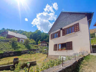 Discover this charming mountain home nestled in a picturesque setting.
