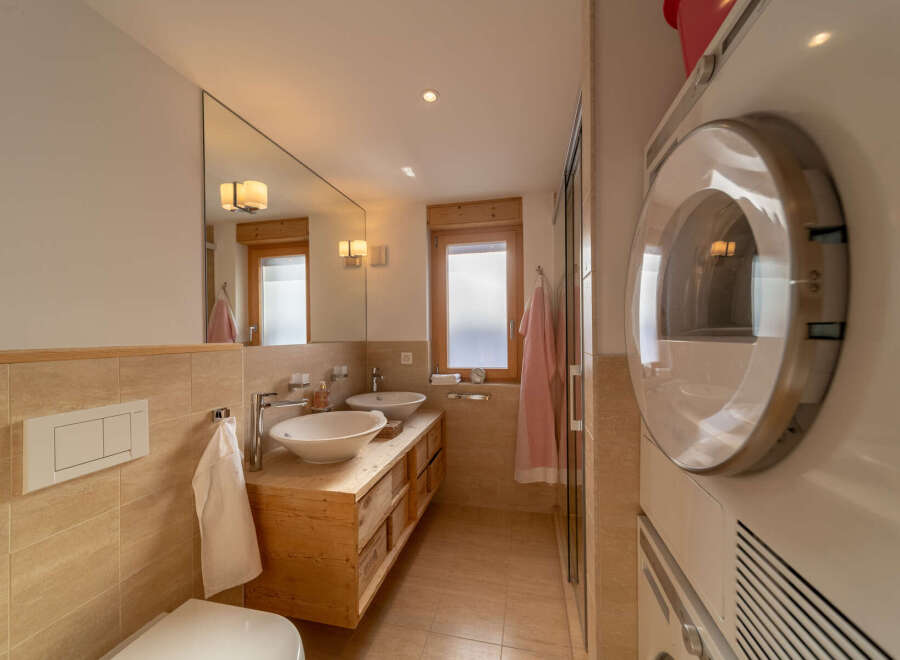 Discover the charm of this beautifully designed bathroom, perfect for a relaxing retreat.