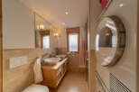Discover the charm of this beautifully designed bathroom, perfect for a relaxing retreat.