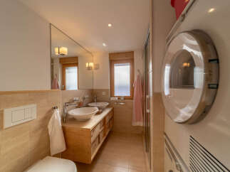 Discover the charm of this beautifully designed bathroom, perfect for a relaxing retreat.