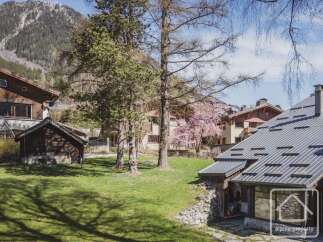 Discover a charming property nestled in a picturesque mountain setting.