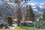 Discover your dream home nestled in the heart of the mountains! This stunning property boasts breathtaking views of the snow-capped peaks and lush greenery.