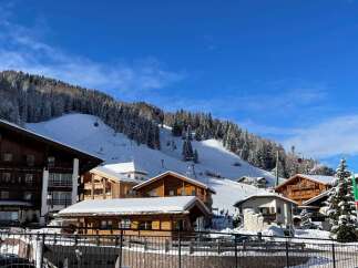 Discover the charm of this stunning mountain property, nestled in a picturesque ski resort.