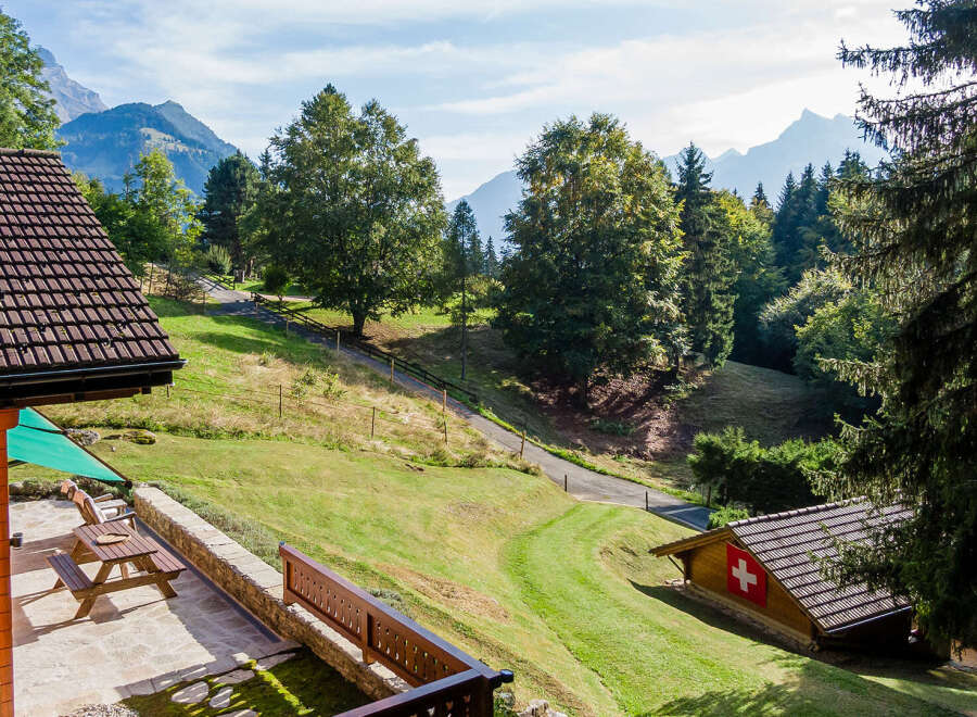 Discover your dream retreat in this charming property nestled amidst breathtaking mountain scenery.