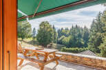 Enjoy breathtaking mountain views from this charming property.