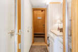 Step into this charming chalet and discover a well-designed laundry area.