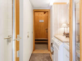 Step into this charming chalet and discover a well-designed laundry area.