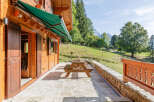 Experience the charm of this stunning wooden chalet, perfectly blending rustic elegance with modern comfort.