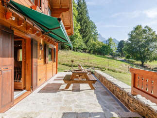 Experience the charm of this stunning wooden chalet, perfectly blending rustic elegance with modern comfort.