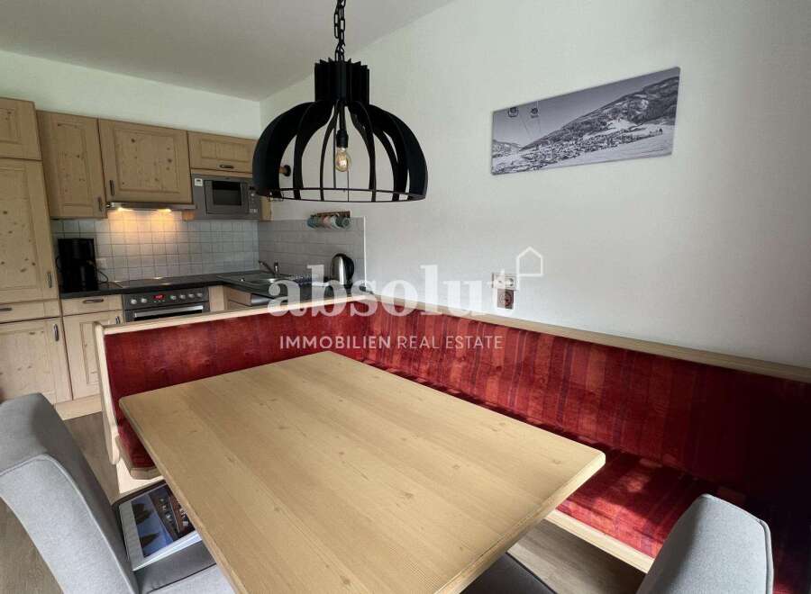 Discover this charming property featuring a cozy dining area perfect for intimate gatherings.