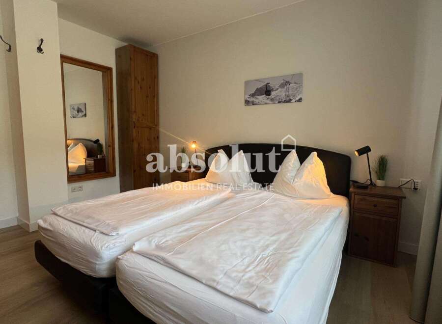 Discover the comfort of this inviting bedroom, perfect for relaxation.