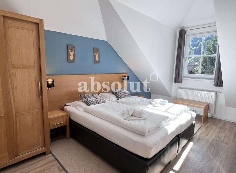 Discover a cozy bedroom retreat in this charming property.