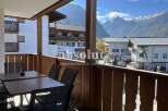 Enjoy breathtaking mountain views from this charming balcony.