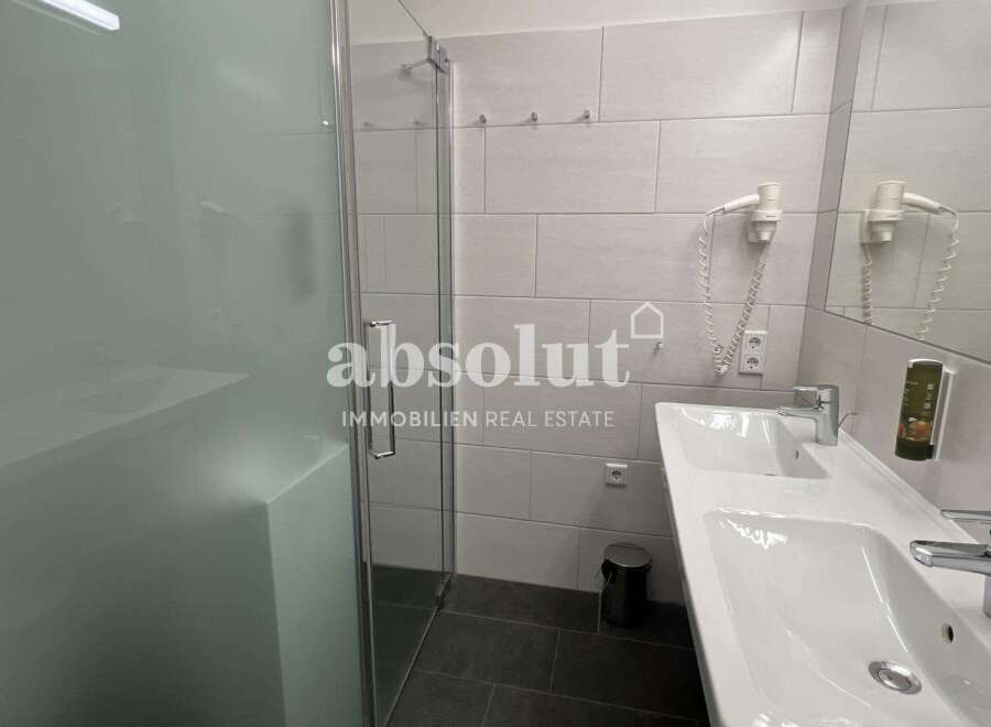 Discover a modern bathroom with a sleek design.