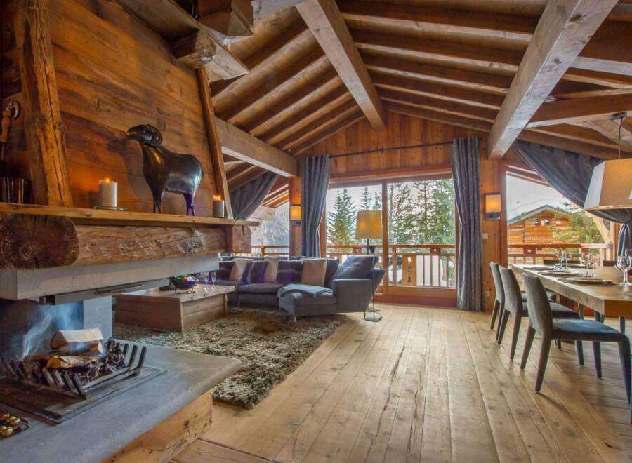 Experience the epitome of luxury living in this stunning chalet, boasting a warm and inviting ambiance.
