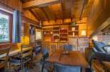 Step into rustic charm with this inviting wooden interior.
