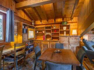 Step into rustic charm with this inviting wooden interior.