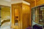 Step into luxury with this stunning property featuring a private sauna and a beautifully tiled shower.