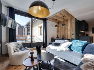 Discover the epitome of alpine living in this stunning property, boasting a modern interior and breathtaking views.