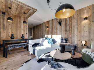 Experience rustic elegance in this stunning property, featuring exquisite wood paneling throughout.
