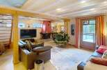 This stunning property boasts a cozy living room with a fireplace, perfect for relaxing evenings.