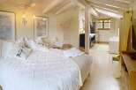 Discover the epitome of comfort and style in this stunning bedroom.