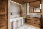Experience luxury in this stunning bathroom featuring a sleek design and high-end finishes.