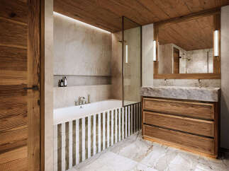 Experience luxury in this stunning bathroom featuring a sleek design and high-end finishes.