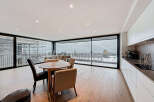 Experience luxury living in this stunning modern apartment with breathtaking views.