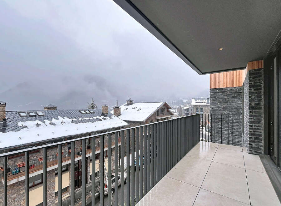Enjoy breathtaking mountain views from this stunning balcony.