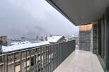 Enjoy breathtaking mountain views from this stunning balcony.