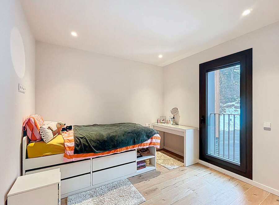 Discover the charm of this inviting bedroom, perfect for relaxation and comfort.