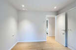 Discover the elegance of this modern property, featuring a bright and airy interior with neutral tones.