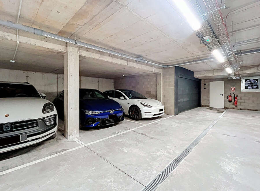 Discover the convenience of secure parking in this modern property.