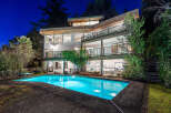 This stunning property boasts a luxurious outdoor pool, perfect for relaxation and entertainment.