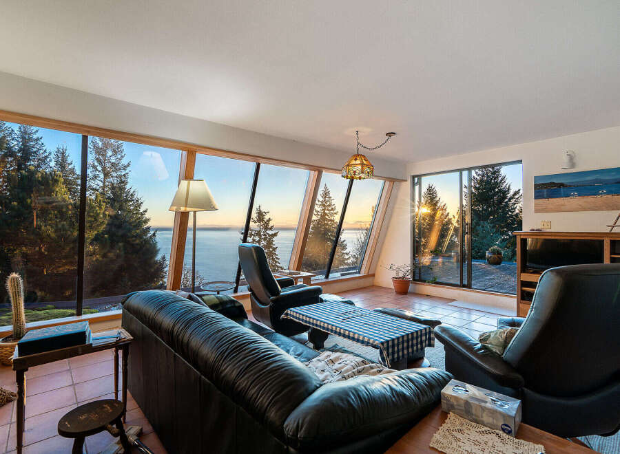 Experience breathtaking views from this stunning waterfront property.