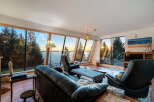 Experience breathtaking views from this stunning waterfront property.