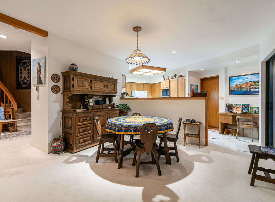Step into this charming home and discover a dining area that exudes warmth and character.