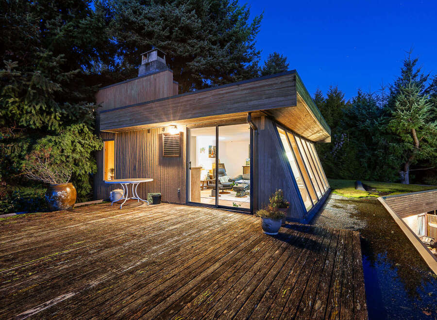 Discover a stunning architectural gem nestled in a serene natural setting.