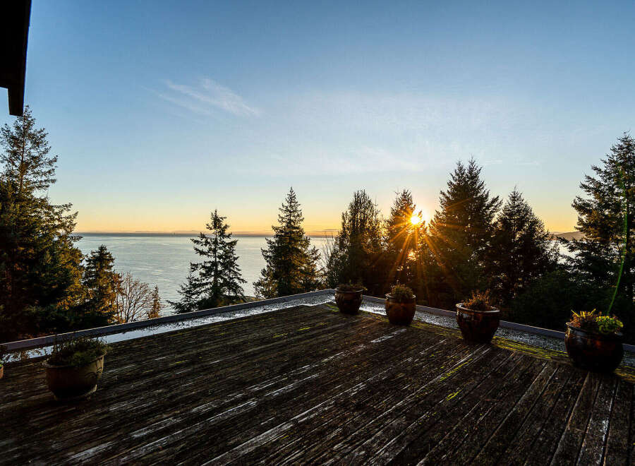 Enjoy breathtaking sunsets and panoramic ocean views from this stunning property.