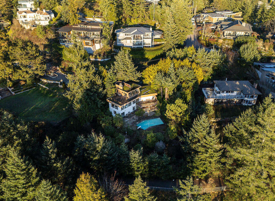 Discover luxury living in this stunning property nestled amidst lush greenery.
